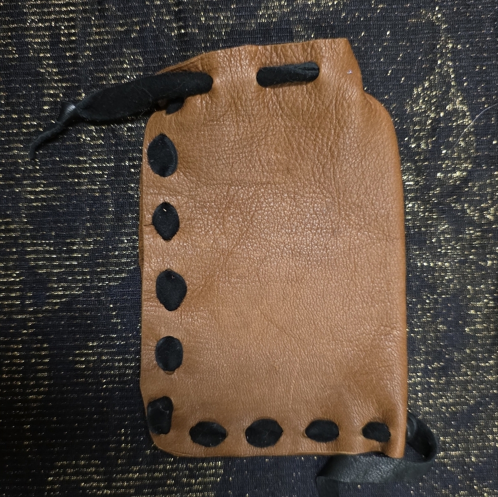 Leather Drawstring  Clutch in Tan with Black Accent